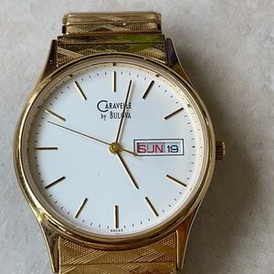 Caravelle men quart w/r day&date strength band